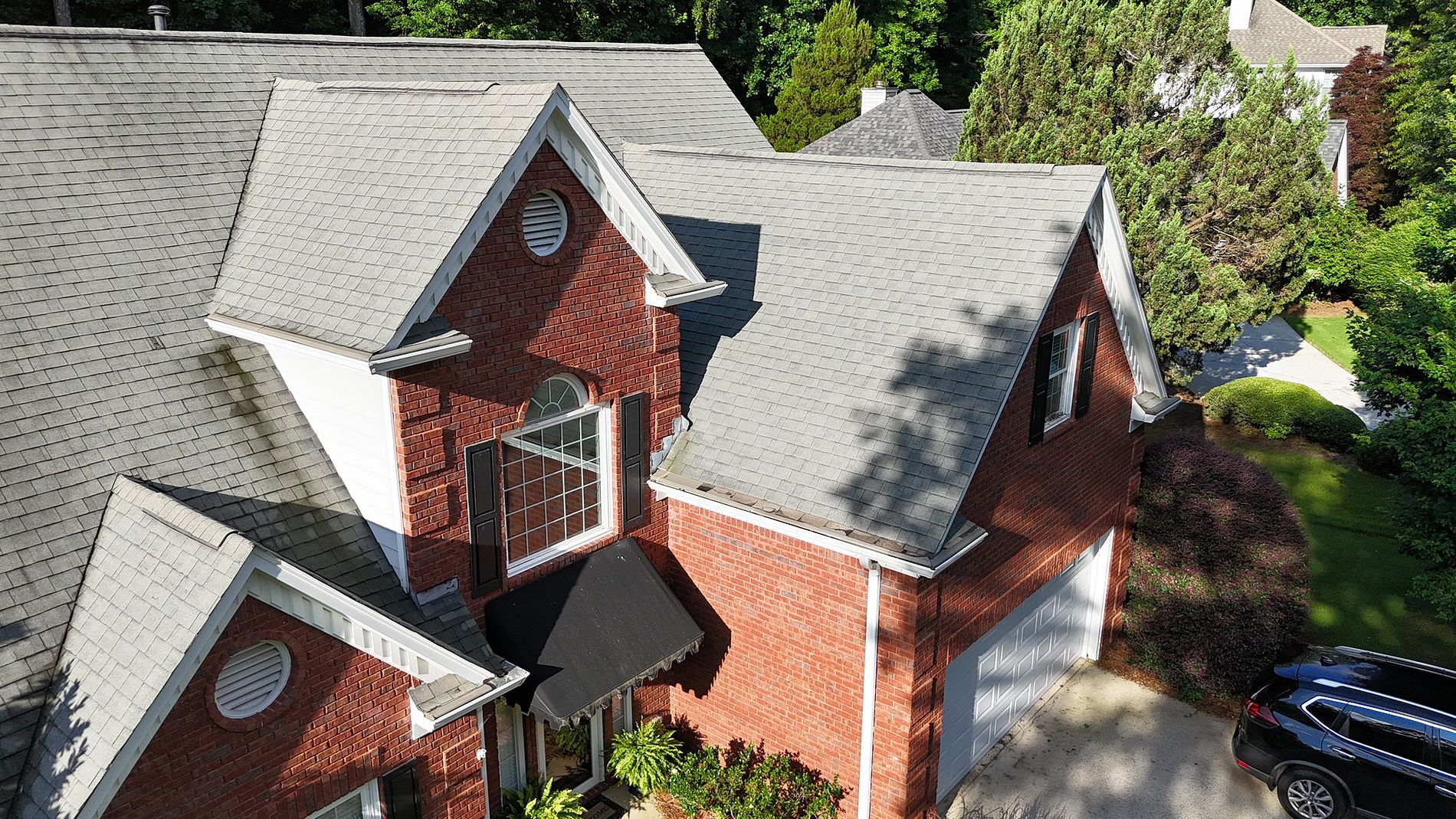 Alpharetta roof replacement aerial closeup — TAMKO Titan XT Rustic Black