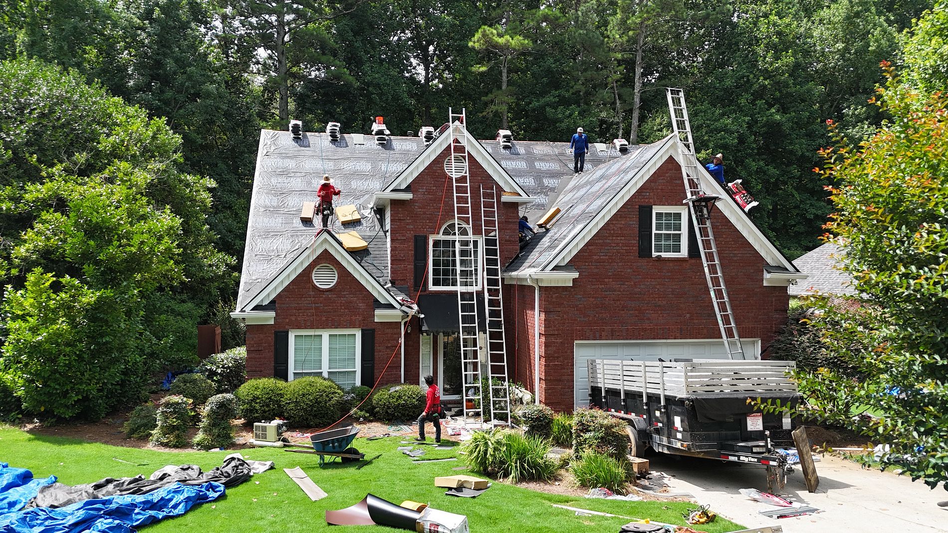 Supreme Roofing crew during tear-off — Alpharetta, GA